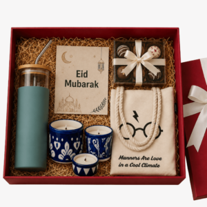 Eid gift box with sweets, candles, and festive essentials