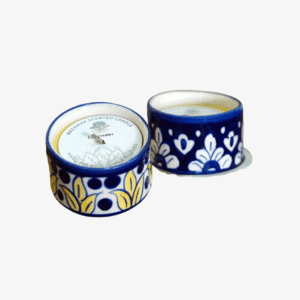 Decorated candles in hand-painted Blue Pottery jars